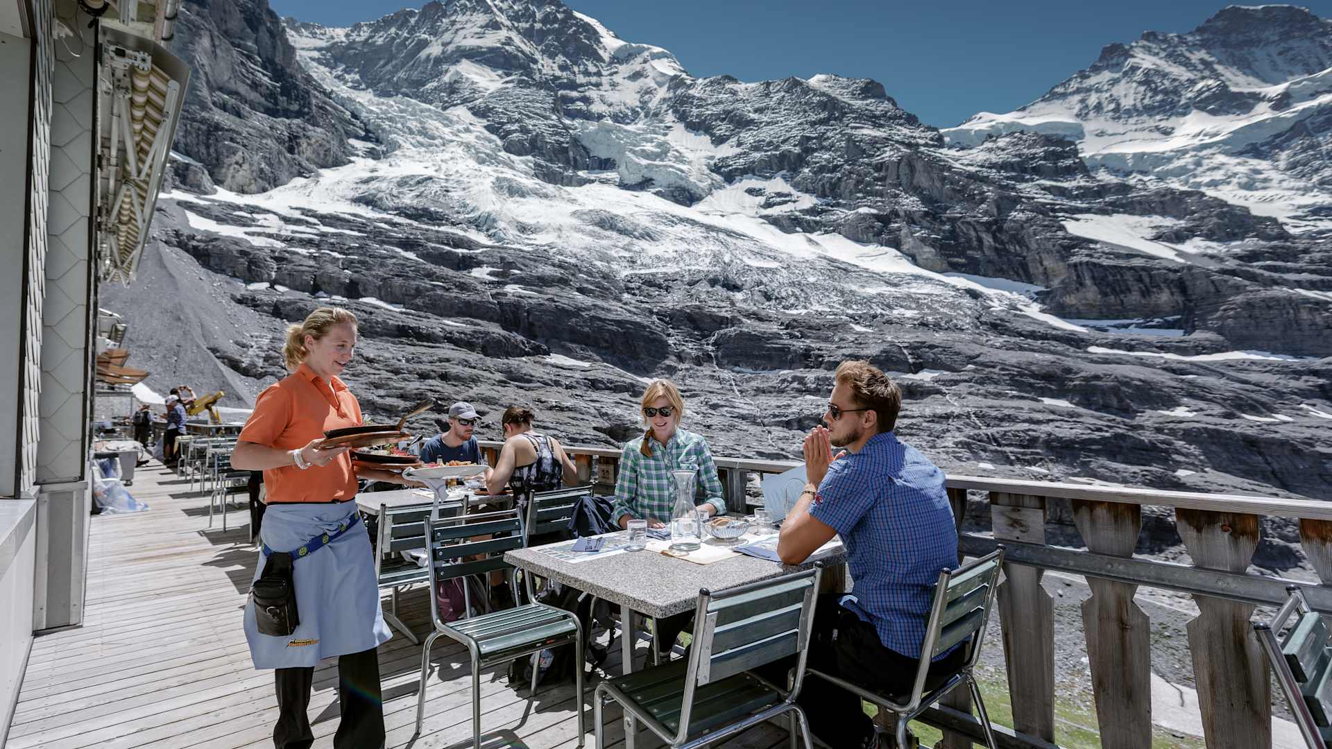 Restaurant Eigergletscher terrace with mountain panorama