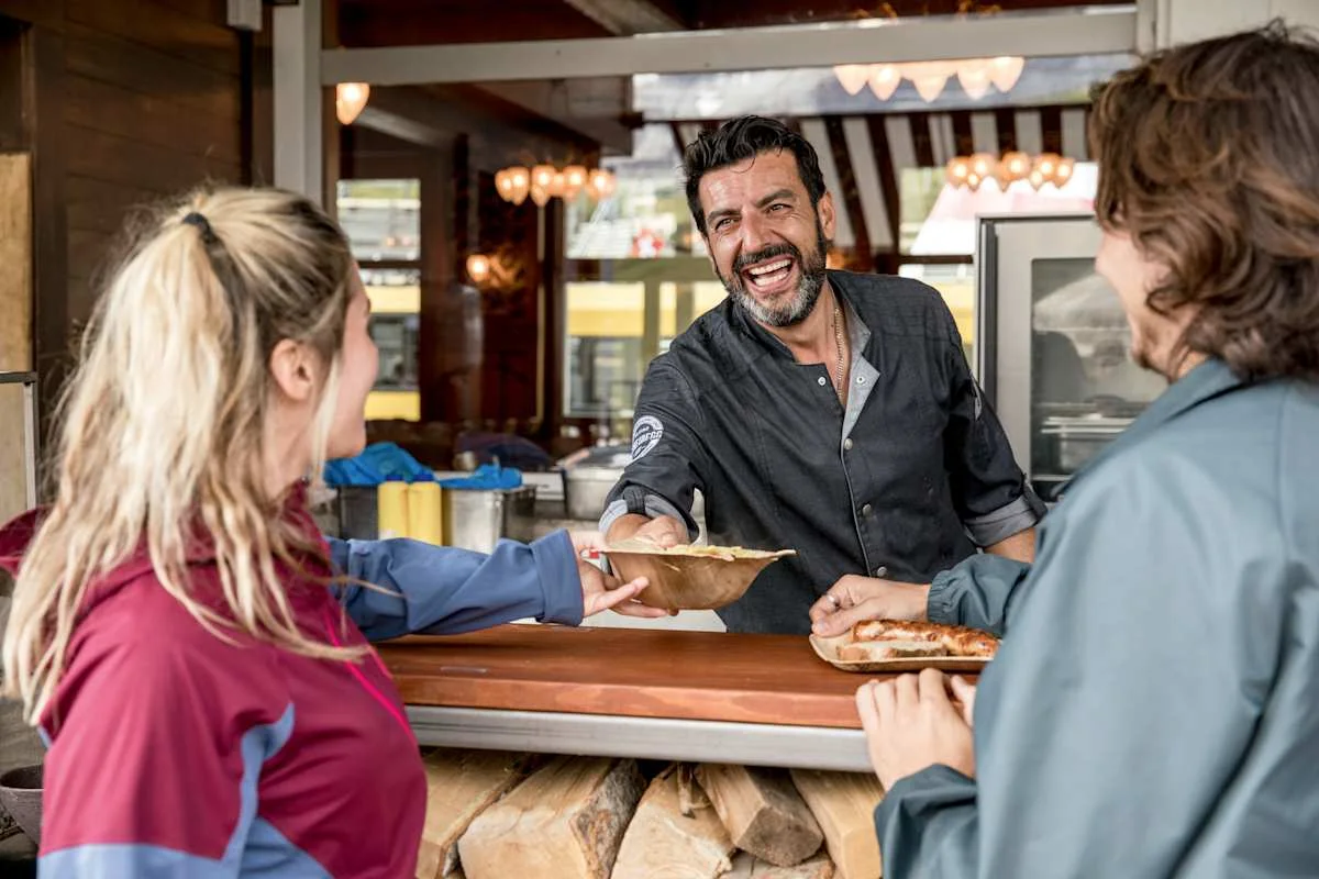 Food service at the outdoor counter of Bergrestaurant Kleine Scheidegg